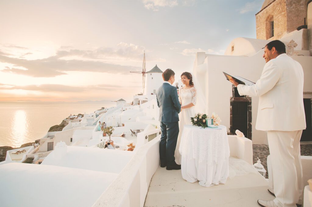 Santorini wedding. Photo by Jon Low Studios. Source